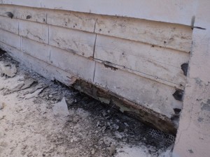 A wall that has been damaged by the weather.